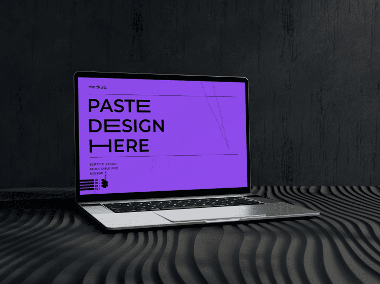 Porject-Imggpng - Corporate video production company in Delhi Laptop on a dark textured surface displaying a purple mockup screen with the text 'PASTE DESIGN HERE'